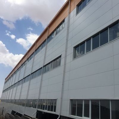 Q345 इस्पात पूर्वनिर्मित घर OEM पूर्वनिर्मित इस्पात संरचना भवन