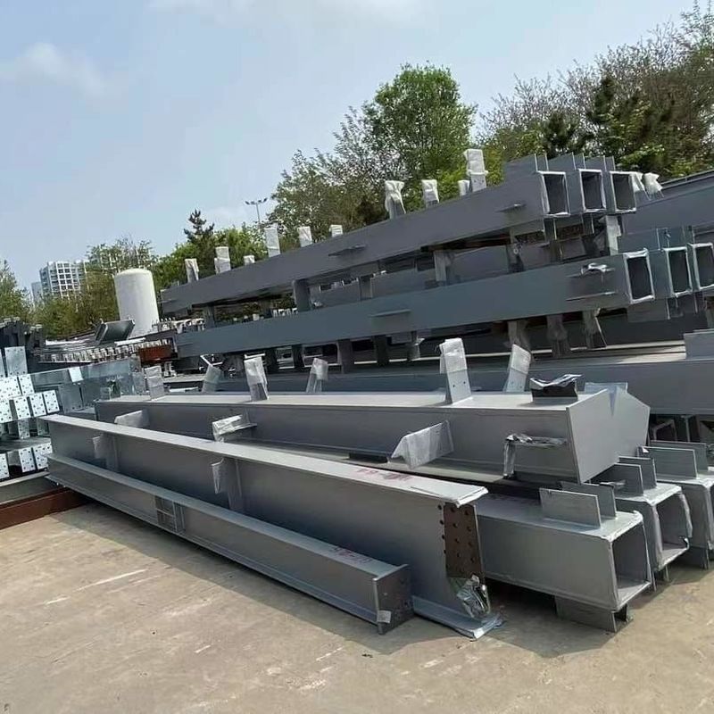 स्टील वेयरहाउस वर्कशॉप के निर्माण के लिए पैनित या गैल्वनाइज्ड स्टील कॉलम और स्टील बीम
